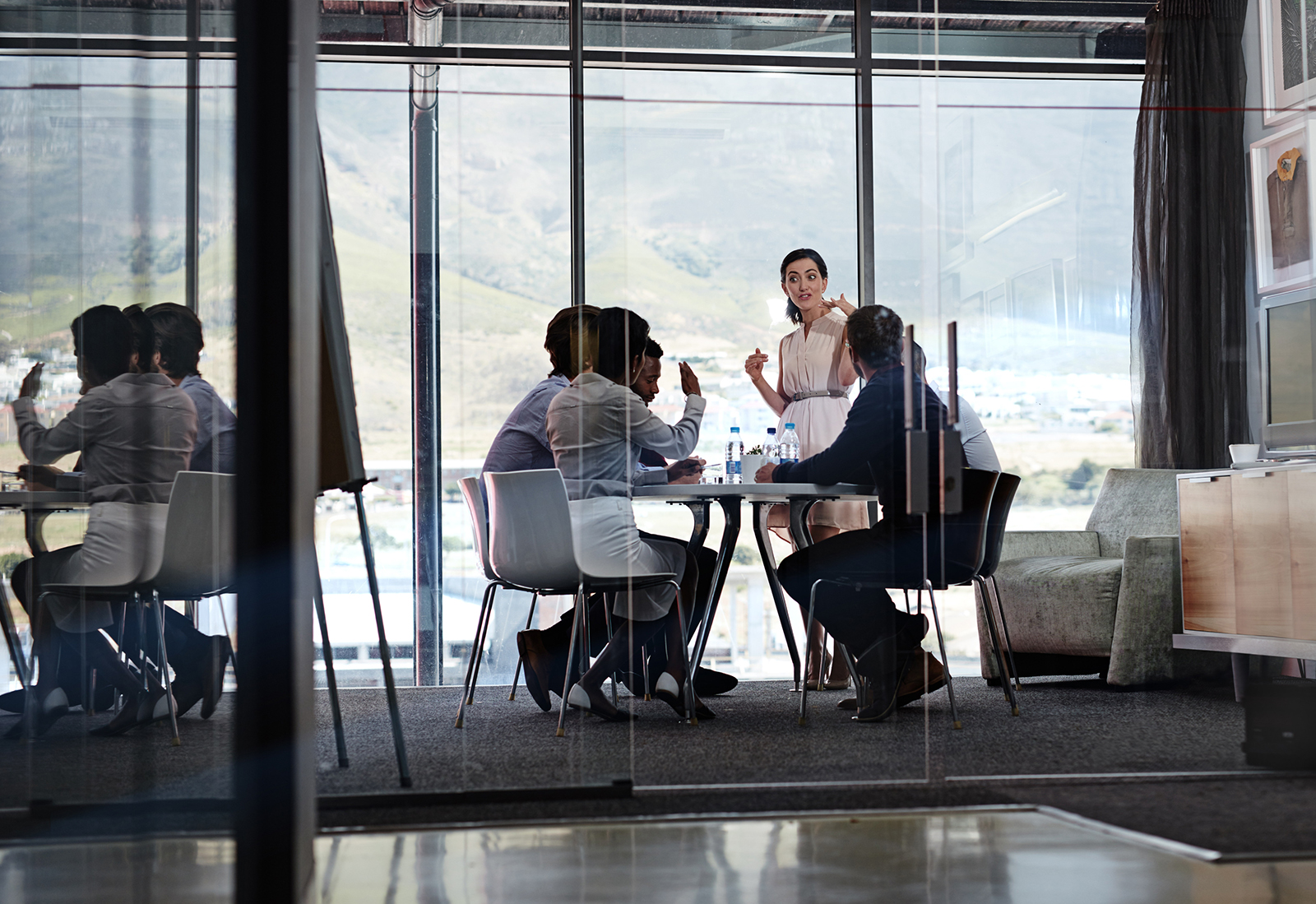 Glass, talking and woman in office, presentation and discussion